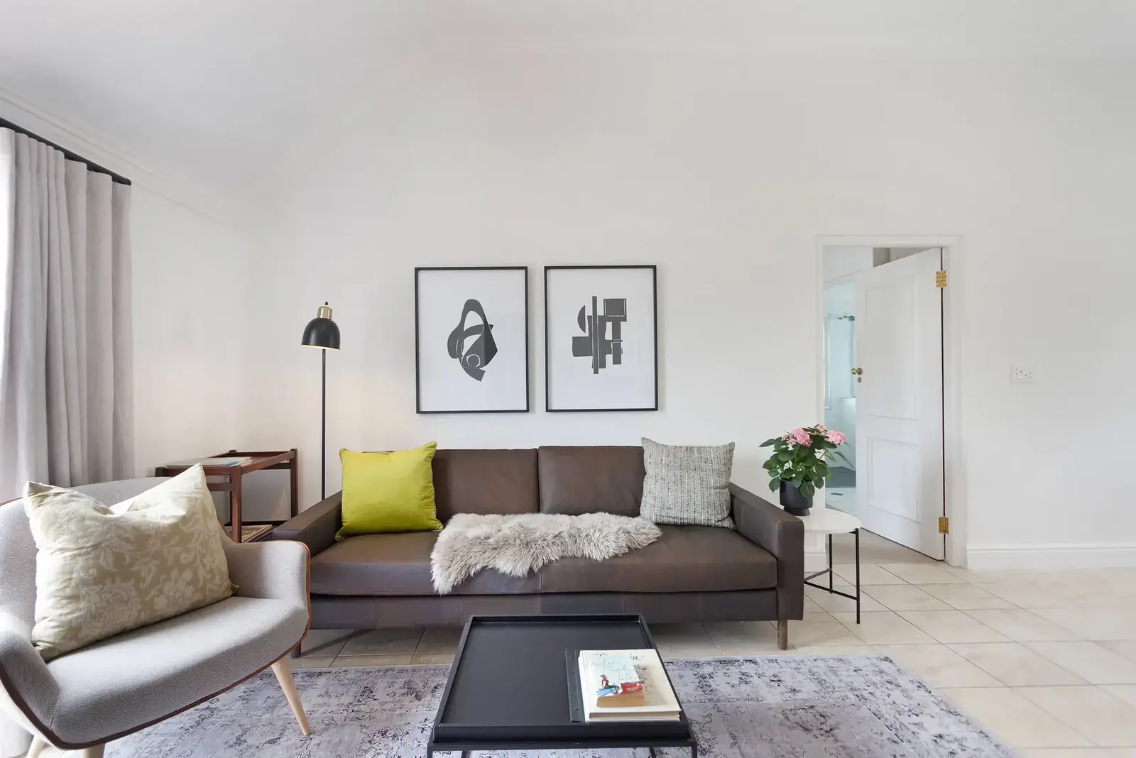 Lodge 9 open-plan lounge with golf fairway views