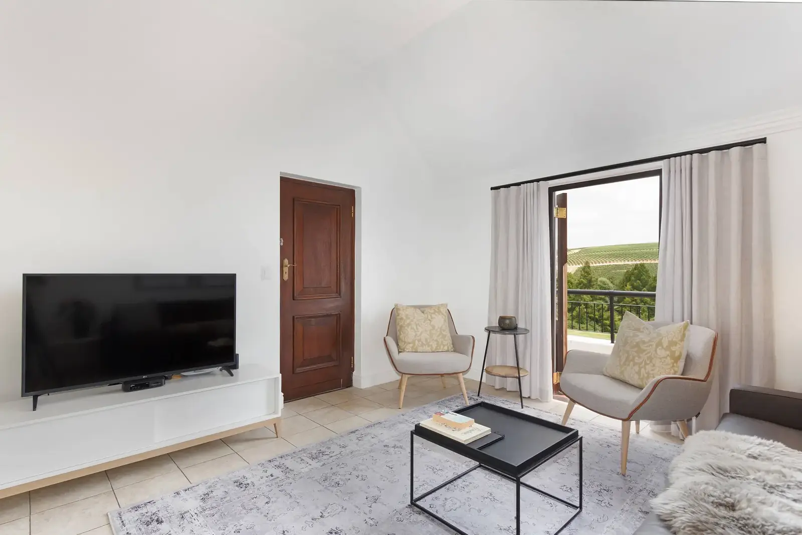 Lodge 9 open-plan lounge with golf fairway views