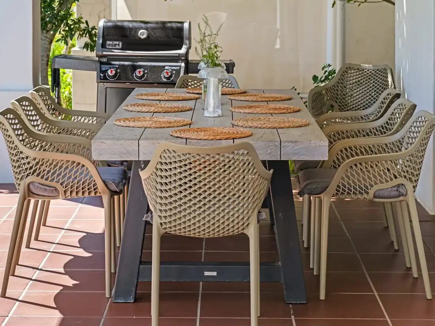 Lodge 2 outdoor patio with built-in braai with golf fairway views