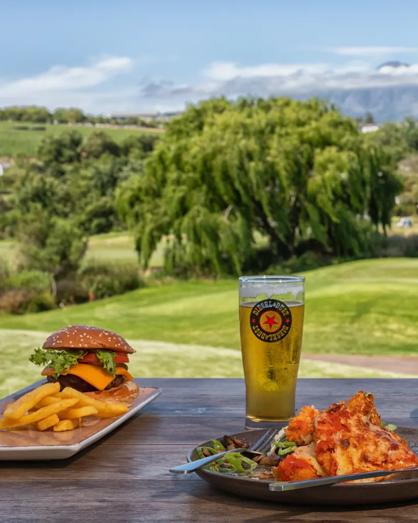 Burger and beer with course view