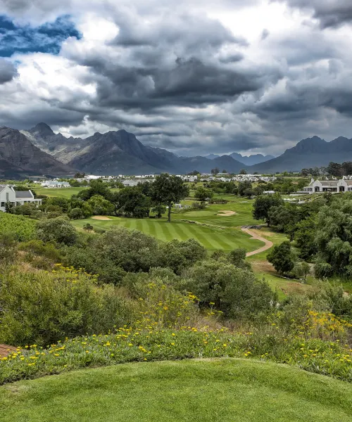 Panoramic view of De Zalze Golf Course fairways with Stellenbosch mountains