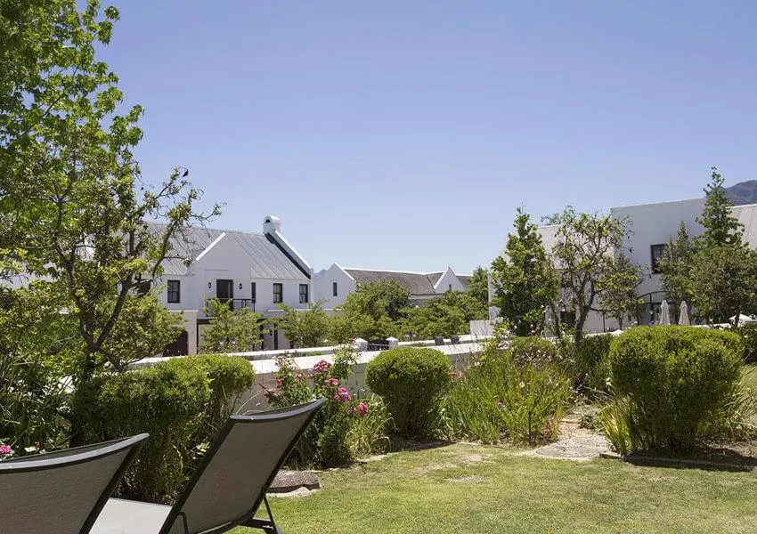 Lodge exterior with private garden at Winelands Golf Lodges in Stellenbosch
