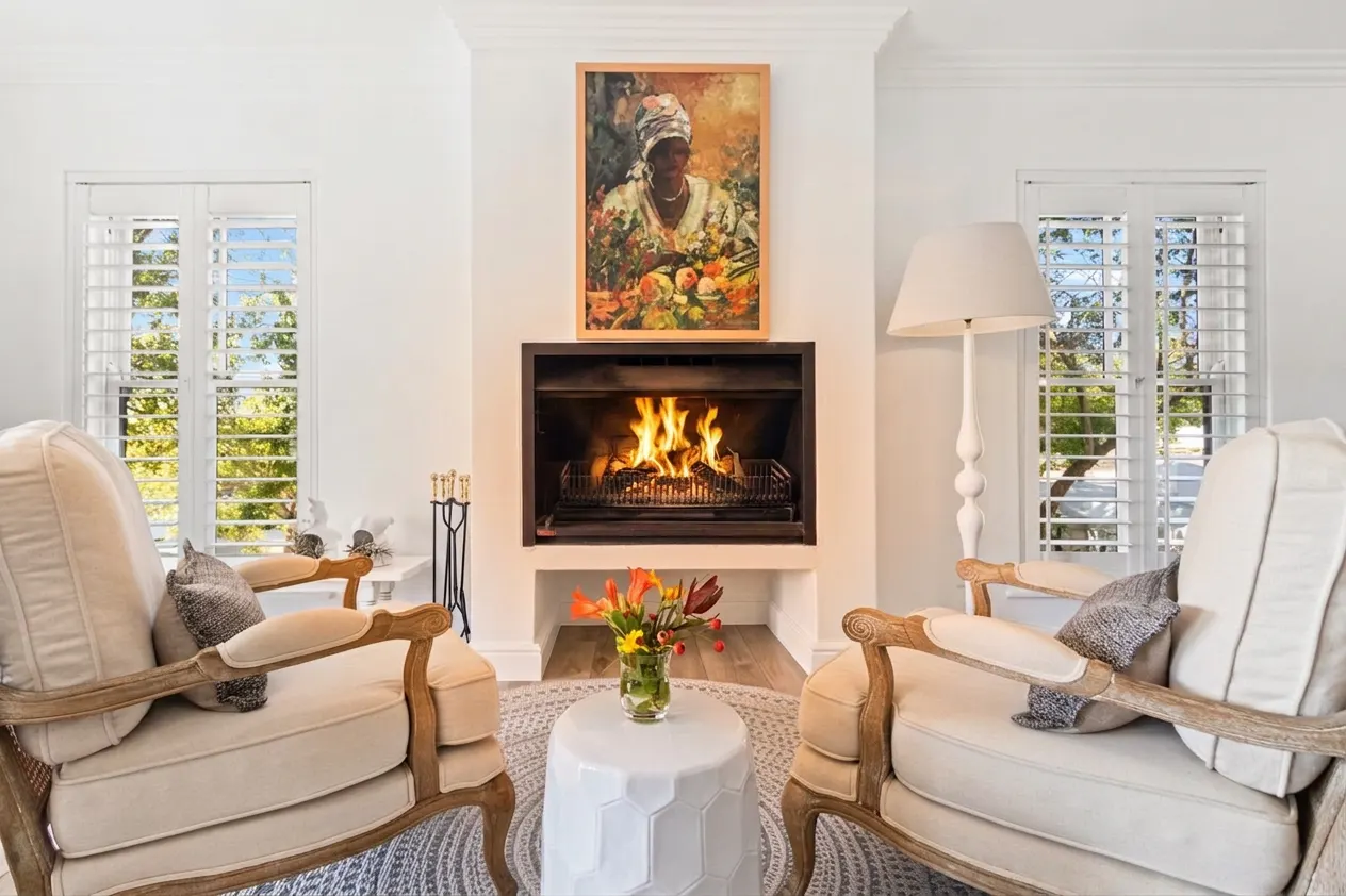 Cosy fireplace lounge at Winelands Golf Lodges in winter