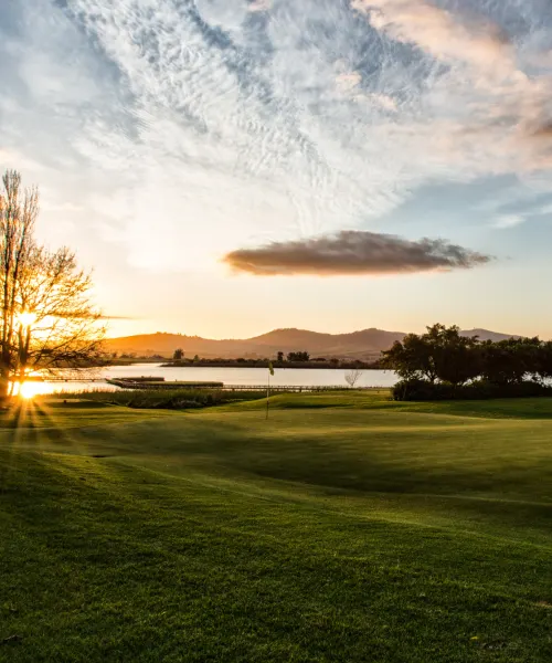 Sunset over the water hazard
