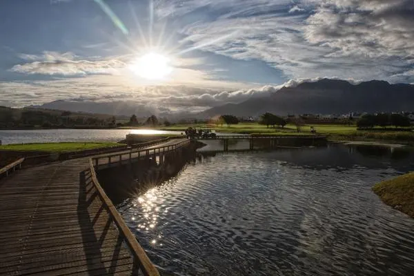 Water hazard with wooden bridge