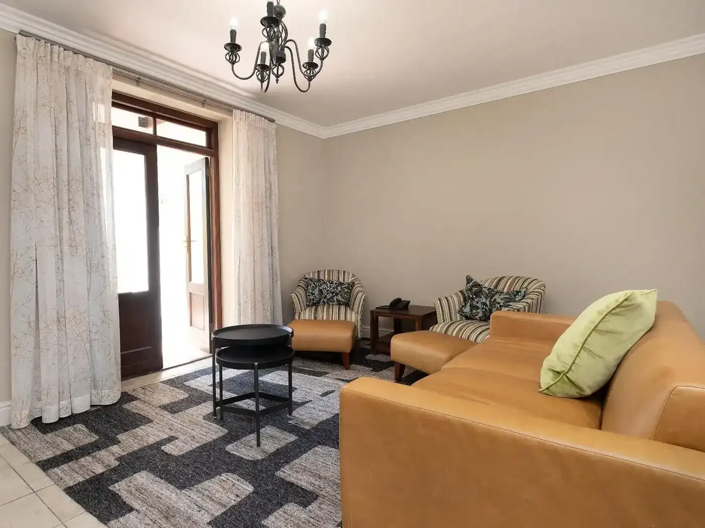 Lodge 13 open-plan lounge with garden views