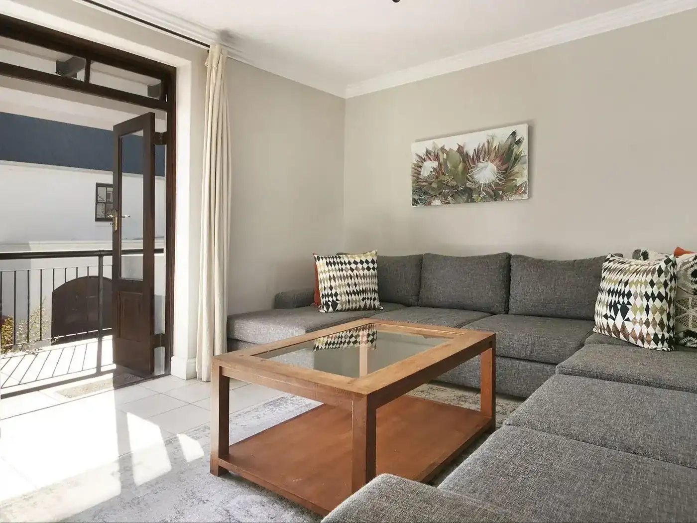 Superior open-plan lounge with garden views