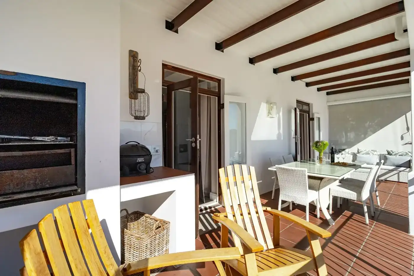 Lodge 24 outdoor patio with built-in braai with mountain views